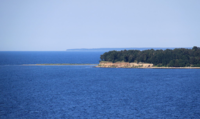 Kakumäe peninsula seen from Tabasalu cliff. 2 August 2010. Photo by Ingvar Pärnamäe. Link: https://en.wikipedia.org/wiki/Kakum%C3%A4e#/media/File:Kakum%C3%A4e_poolsaar.JPG